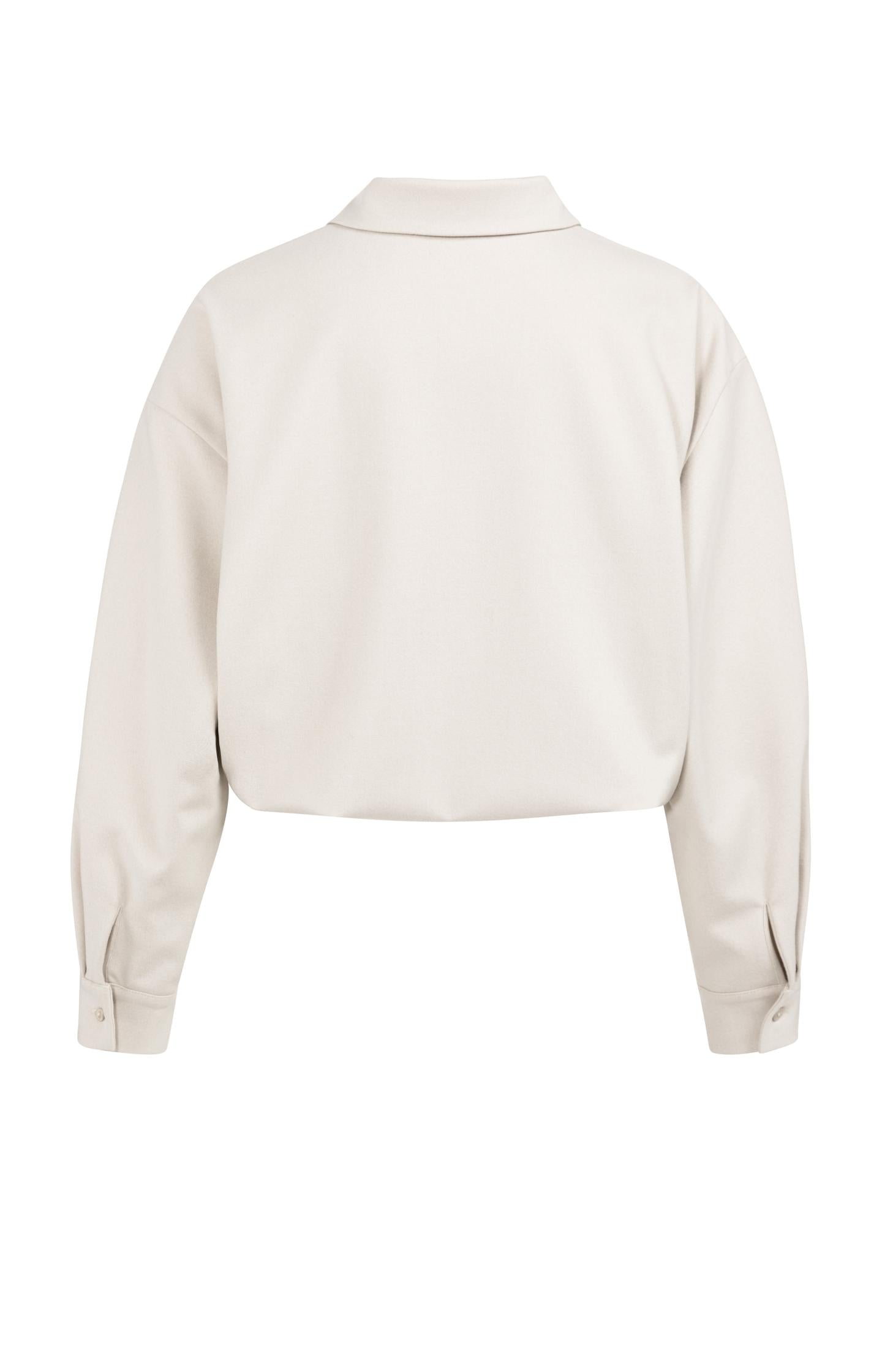 Blouse with asymmetric button placket and elastic hem