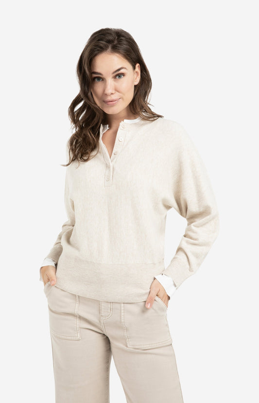 Sweater with inserted blouse collar and button detail